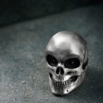 Intenebris Oversize Satin Evil Eye Skull Ring with Shiny Teeth in sterling silver